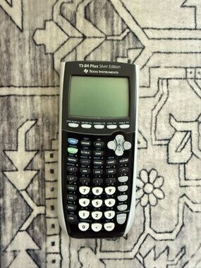 Vintage Texas Instruments TI-1250 basic math calculator introduced in 1975 on a white background Stock Photo